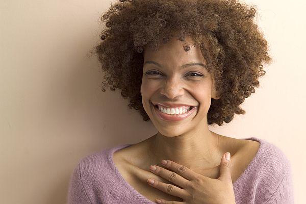 Flattered Woman Smiling