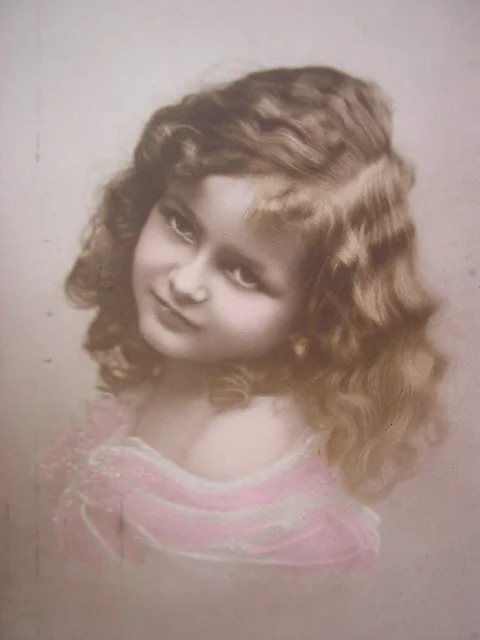 vintage photography - a little girl posing for a photo