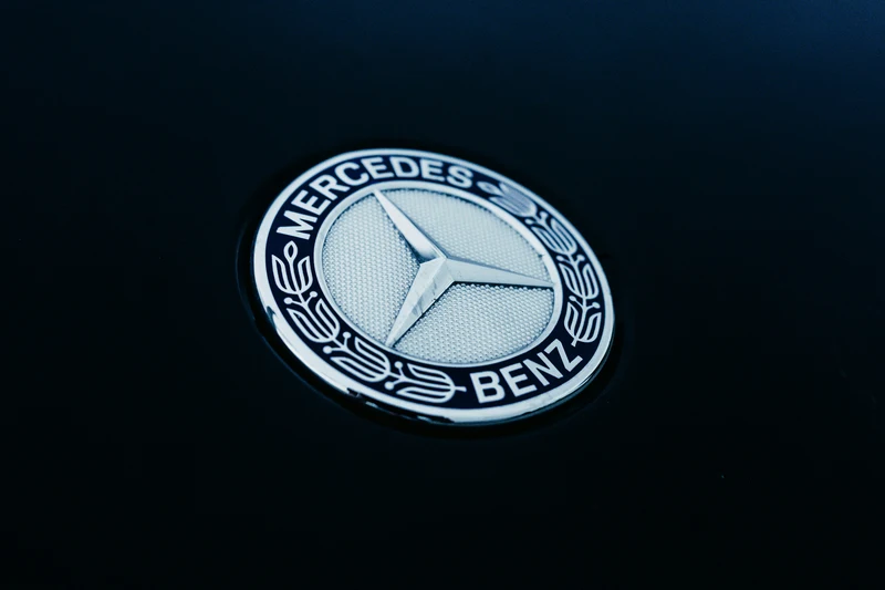 Mercedes-Benz three-pointed star luxury automobile logo
